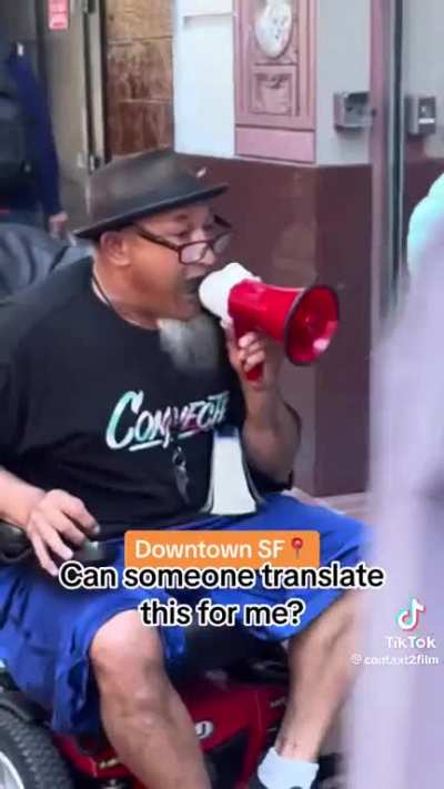 man in wheel chair on megaphone (San Francisco) ?