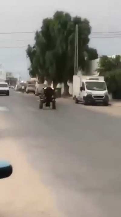 how to wheelie a quad