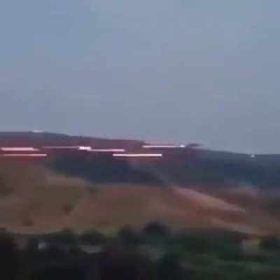 Bunch Of Helicopters Shooting A Target.