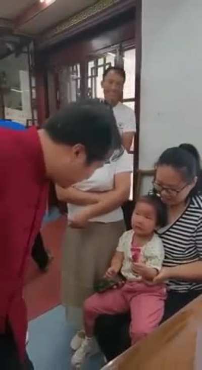 Doctor repositions child's dislocated elbow before she even notices.