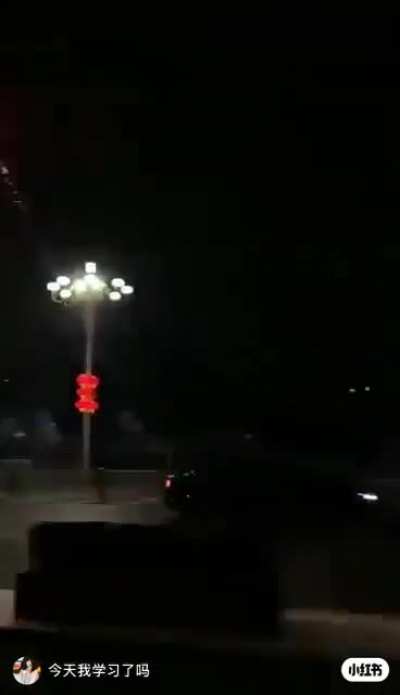 Fireworks are banned in Shandong so this driver just lit fireworks from the car while the police chased them