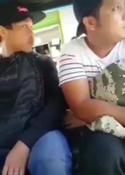 Pick pocketing on a bus.