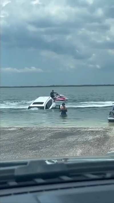 WCGW forgetting your parking break on the boat ramp
