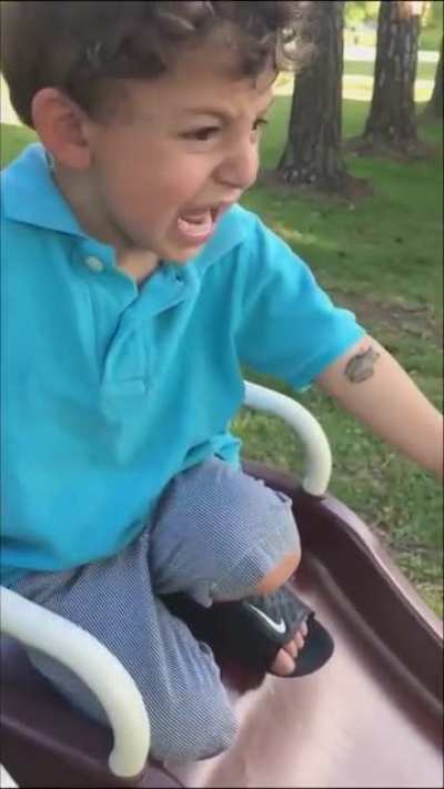 A frog jumps on the kid's face ?