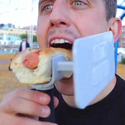 I build unnecessary inventions and the Glizzy Gripper helps you eat hot dogs more discreetly.