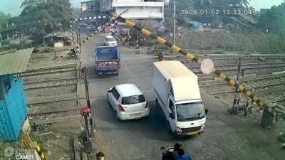 Not stopping for the railway level crossing inspite of warning sounds blaring
