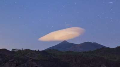 ? Sometimes these other worldly Lenticular clouds form at downwind of hills or mountains ,looking unnatural and mystic.