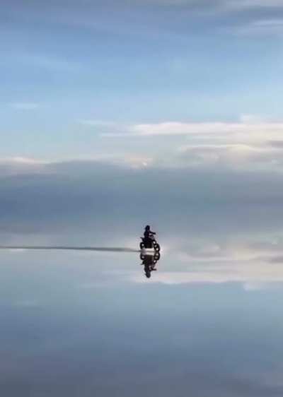 Salar De Uyuni is the world’s largest salt flat, following rain a thin layer of calm water transforms the flat into the world largest mirror 80 miles across.