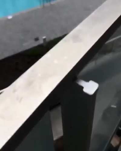 WCGW popping champagne on a balcony?