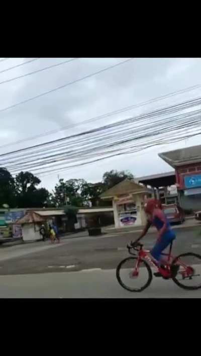 WCGW spiderman waving at people and did not paying attention to a road