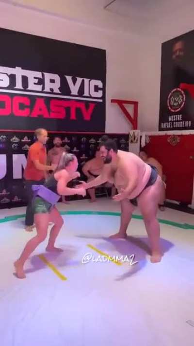 An exotic dancer turned MMA fighter declared "size doesn't matter" and challenged a sumo wrestler