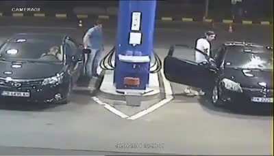 Gas station worker puts out the cigarette as a precaution