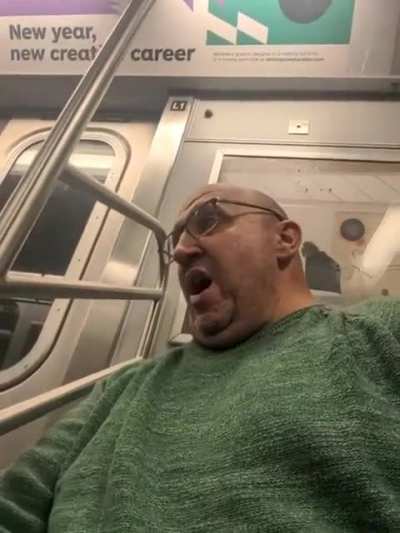 This man singing on the subway