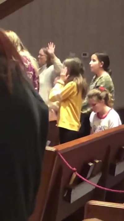 Girl doing Macarena during Sinner’s Prayer