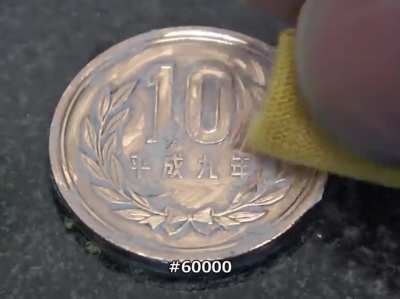 Polishing 10 yen coin