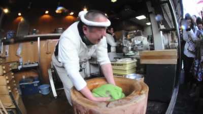 Mochitsuki, the tradition of "mochi-pounding", where one person hand-mixes the rice dough and one person pounds it using a wooden mallet called a kine.