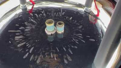 My son and I built a cloud chamber particle detector. This is our sample of Plutonium in it.