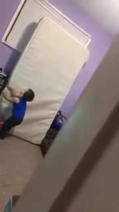 WCGW while moving a mattress.