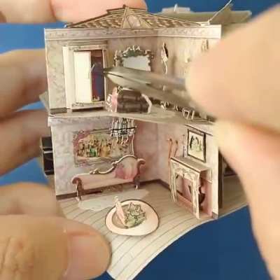 Doll house inside a tiny book