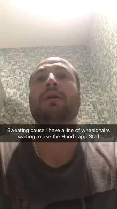 A line formed outside the handicapped stall
