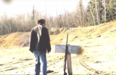 guys gun falls after setting it down on faulty post and shoots himself