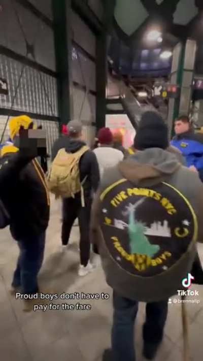 NYPD help Proud Boys commit fare evasion in the NY subway and then tell journalists to go back and pay for the fare. Everyone should see this video.