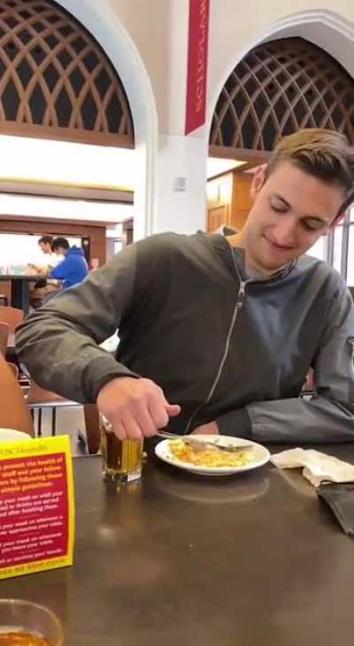 Engineering students make a jacket that replaces apple juice with beer in the dining hall.