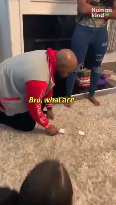 This wholesome surprise proposal during family night
