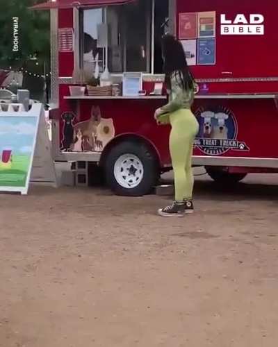 This food truck has a golden retriever that comes out and delivers the snacks..
