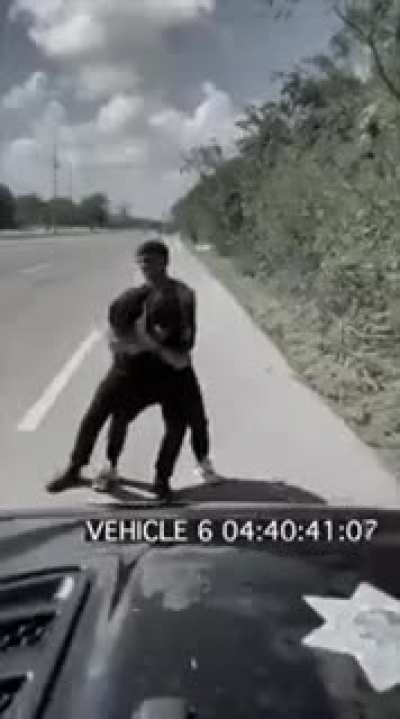 Dude saves a cop seconds after he is arrested