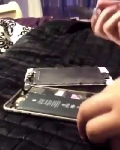 Kids "Fix" a broken phone