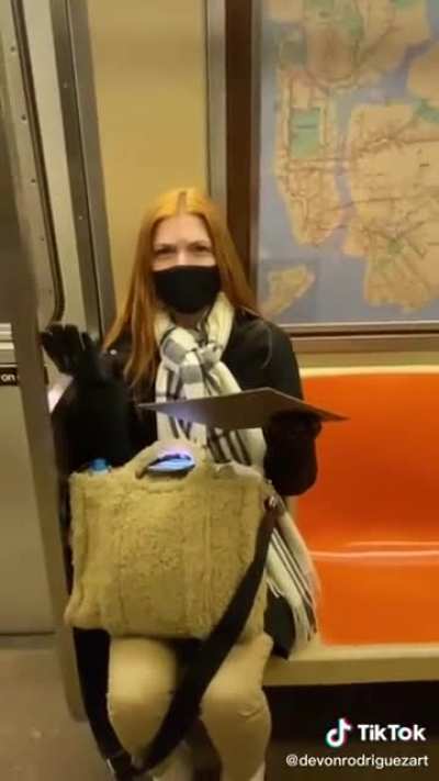 Painting a stranger on the subway results in surprise followed by tears of happiness.