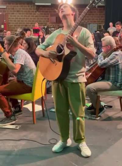 Shredding guitar acoustically