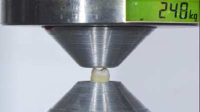 Hydraulic press vs a real human tooth