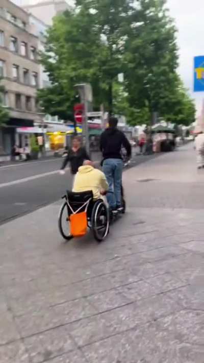 to pull someone in a wheelchair using an E-Scooter