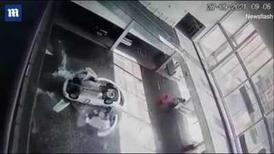 Car Washing Service Rep with no Drivers License Drives off 2nd floor Mezzanine crushing receptionist. (Shes in critical condition)