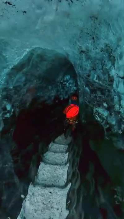 Waking through an ice cave on a glacier
