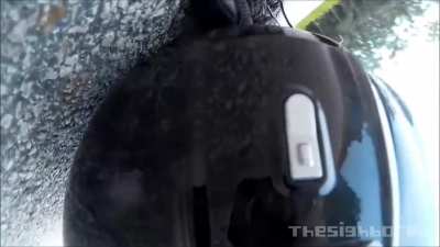 Biker hits boar at speed in Malaysia