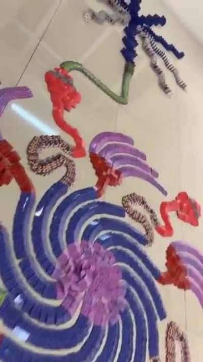 This piece of art that is falling cardominos: highly satisfying