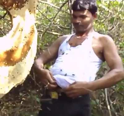 This man stuff bees down his vest is the strangest thing I see.