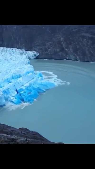 ? Rare footage of when an iceberg flips and a Blue Iceberg is formed
