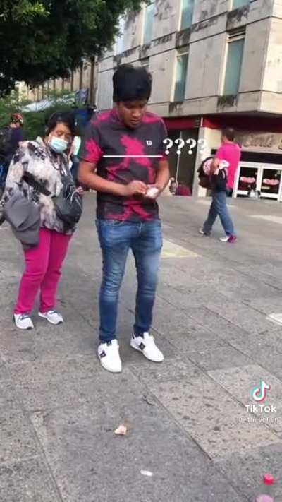 Mexican street performer making random items dance.