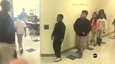Teacher having amazing handshakes with each student