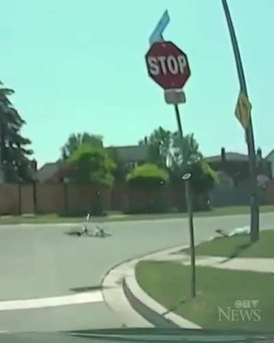 Car blows through the Stop sign in residential neighborhood narrowly missing an 11 year old boy