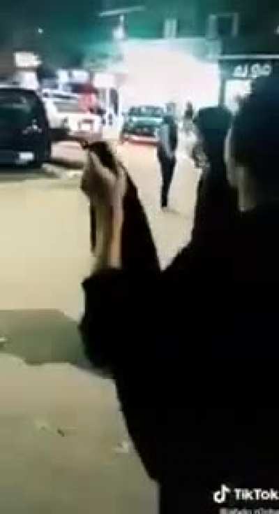 Cleaning a car that's moving with a really long shirt/dress?
