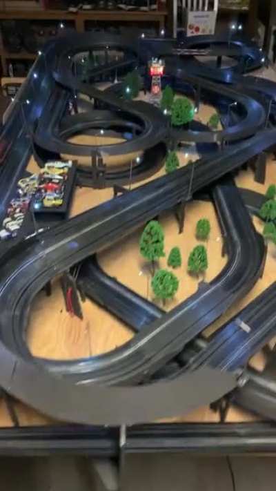 Some father and son slot car dicing at dusk. [OC]