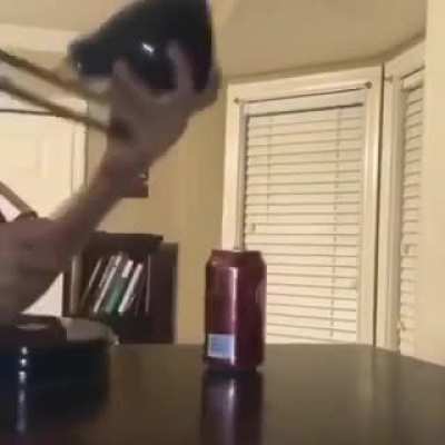 Pixar with a dr pepper can