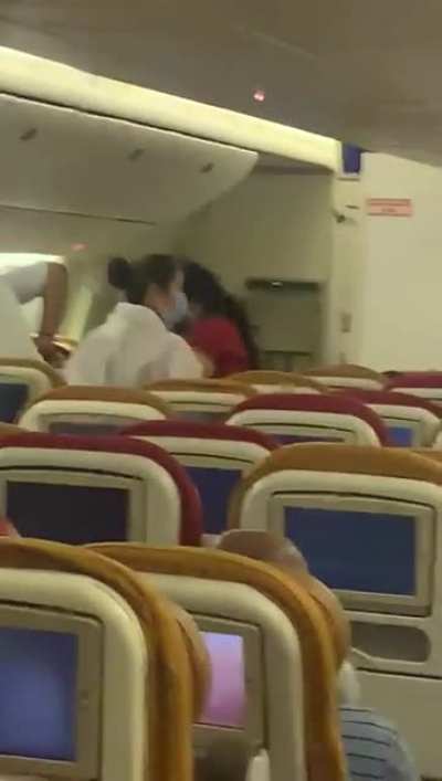 Flight from India to NY had to go back and land because a BAT ? was flying in business class, in other news; Bruce Fucking Wayne was visiting India.