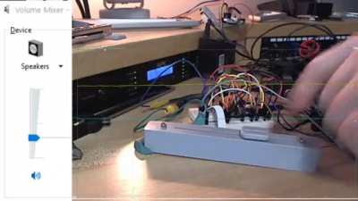 Volume control slider for desk