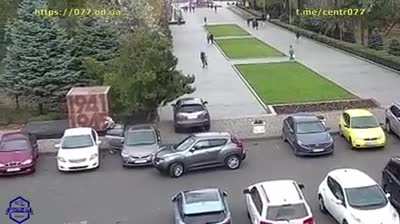 Idiot sends car rolling down the street